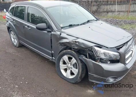 2011 Dodge Caliber Mainstreet z USA, uszkodzony, nr VIN 1B3CB3HA2BD247135